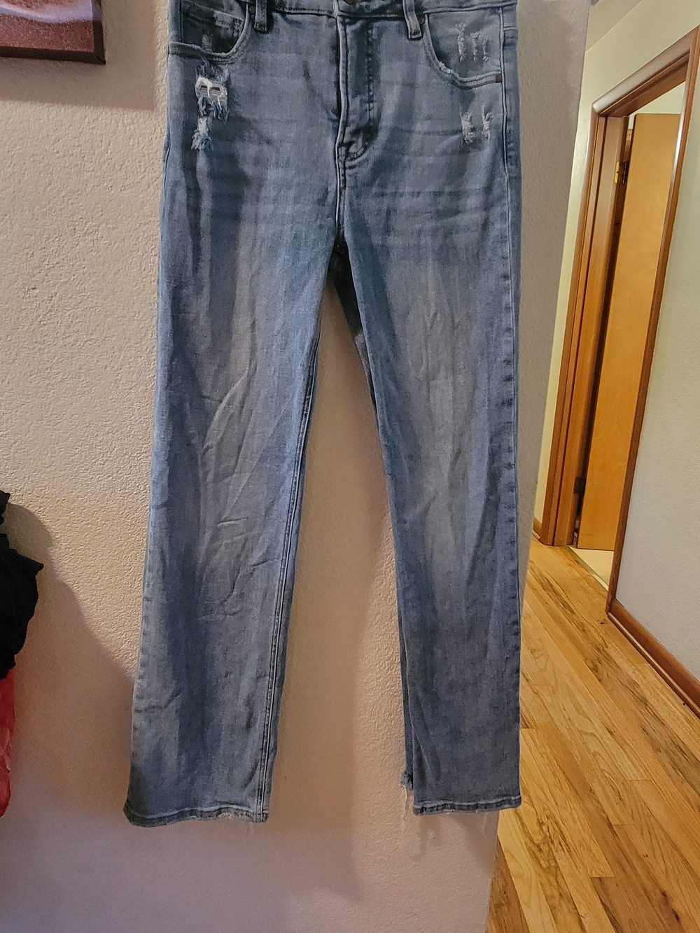 Women’s Straight Leg Light Blue Distressed Jeans